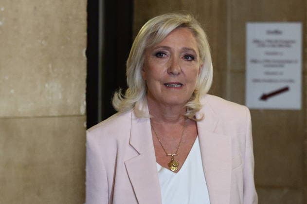 Marine Le Pen Appeal Trial Decision - Paris Marine Le Pen arriving at Paris courthouse before the decision on the appeal trial of President of the parliamentary group of the French far-right Rassemblement National (RN) party, Marine Le Pen and officials of French far-right Rassemblement National (RN) party on suspicion of embezzlement of European public funds, in Paris on July 7, 2026. The appeal comes after a court last year barred Le Pen from running for office for five years over a European Parliament fake-jobs scam involving her and other officials from her National Rally party. Photo by Raphael Lagargue ABACAPRESS.COM Paris France  Copyright: xLafarguexRaphael ABACAx