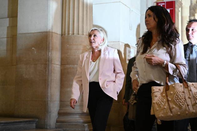 French far-right leader Marine Le Pen arrives at Paris courthouse for verdict in appeal trial PARIS, FRANCE - JULY 7: Member of parliament for the far-right Rassemblement National (National Rally - RN) party Marine Le Pen arrives ahead of the hearing for the verdict in her appeal trial at the Paris courthouse on the Ile de la Cite, in Paris, France on July 7, 2026. Mustafa Yalcin Anadolu Paris World. Editorial use only. Please get in touch for any other usage.  Copyright: x2026xAnadoluxMustafaxYalcinx