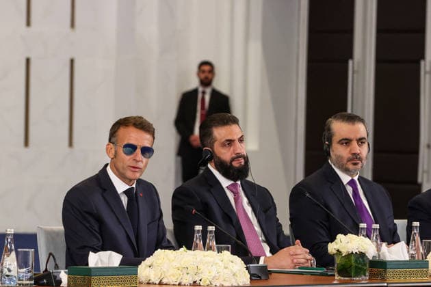 Syrian President Ahmed Shara and French President Emmanuel Macron address Syria-France Economic Forum in Damascus DAMASCUS, SYRIA - JULY 7: Syrian President Ahmed Shara (C), French President Emmanuel Macron (L), who is on an official visit to Damascus, and Syrian Foreign Minister Asad Hasan Shaybani (R) attend the Syria-France Economic Forum, in Damascus, Syria on July 7, 2026. Izz Aldien Alqasem Anadolu Damascus Syria. Editorial use only. Please get in touch for any other usage.  Copyright: x2026xAnadoluxIzzxAldienxAlqasemx