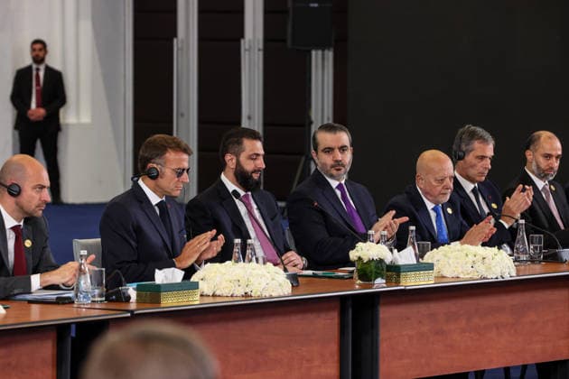 Syrian President Ahmed Shara and French President Emmanuel Macron address Syria-France Economic Forum in Damascus DAMASCUS, SYRIA - JULY 7: French President Emmanuel Macron (2nd L), who is on an official visit to Damascus, and Syrian President Ahmed Shara (3rd L) deliver speeches during the Syria-France Economic Forum, also attended by Syrian Foreign Minister Asad Hasan Shaybani (C), in Damascus, Syria on July 7, 2026. Izz Aldien Alqasem Anadolu Damascus Syria. Editorial use only. Please get in touch for any other usage.  Copyright: x2026xAnadoluxIzzxAldienxAlqasemx