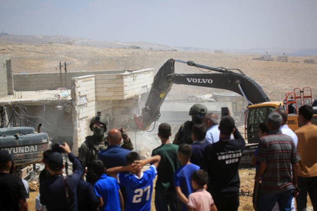 Israeli authorities demolish homes in Yatta south of Hebron Palestinians inspect demolished homes after Israeli authorities carried out demolition operations in the Yatta area, south of Hebron, in the occupied West Bank, on July 7, 2026. According to local sources, several homes were demolished on the grounds of lacking building permits, leaving a number of families displaced and causing damage to property. Photo by Mamoun Wazwaz apaimages Hebron West Bank Palestinian Territory 070726_Hebron_MW_00(27) Copyright: xapaimagesxMamounxWazwazx xapaimagesx