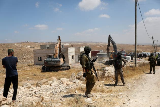 Israeli authorities demolish homes in Yatta south of Hebron Palestinians inspect demolished homes after Israeli authorities carried out demolition operations in the Yatta area, south of Hebron, in the occupied West Bank, on July 7, 2026. According to local sources, several homes were demolished on the grounds of lacking building permits, leaving a number of families displaced and causing damage to property. Photo by Mamoun Wazwaz apaimages Hebron West Bank Palestinian Territory 070726_Hebron_MW_00(5) Copyright: xapaimagesxMamounxWazwazx xapaimagesx