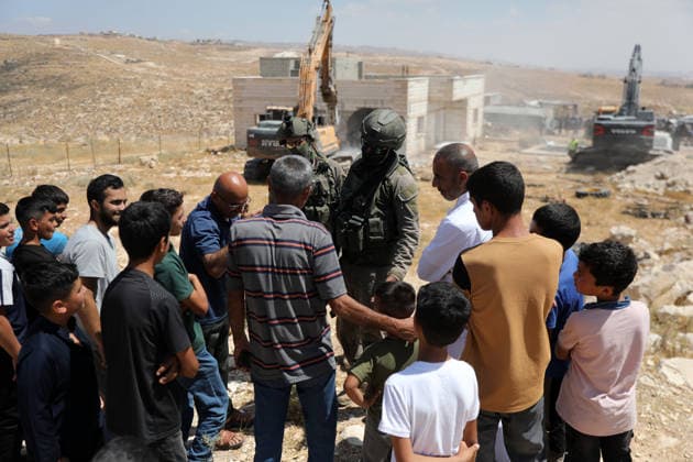 Israeli authorities demolish homes in Yatta south of Hebron Palestinians inspect demolished homes after Israeli authorities carried out demolition operations in the Yatta area, south of Hebron, in the occupied West Bank, on July 7, 2026. According to local sources, several homes were demolished on the grounds of lacking building permits, leaving a number of families displaced and causing damage to property. Photo by Mamoun Wazwaz apaimages Hebron West Bank Palestinian Territory 070726_Hebron_MW_00(8) Copyright: xapaimagesxMamounxWazwazx xapaimagesx