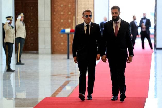 President Macron with President al-Sharaa Meeting - Damascus France s President Emmanuel Macron (L) and Syria s President Ahmed al-Sharaa arrive ahead of their meeting at the People s Palace in Damascus on July 7, 2026. Syria s President Ahmed al-Sharaa hailed France s constructive role in the transition since the toppling of longtime ruler Bashar al-Assad, as French leader Emmanuel Macron made the first post-conflict visit to Damascus by a Western European leader. Photo by Ludovic Marin Pool ABACAPRESS.COM Damascus Syria  Copyright: xMarinxLudovic Pool ABACAx