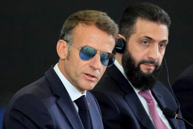 President Macron Visits Syria - Economic Forum France s President Emmanuel Macron (L) and Syria s President Ahmed al-Sharaa take part in the Economic forum focusing on the reconstruction of Syria and strategic corridors, in Damascus on July 7, 2026. Syria s President Ahmed al-Sharaa hailed France s constructive role in the transition since the toppling of longtime ruler Bashar al-Assad, as French leader Emmanuel Macron made the first post-conflict visit to Damascus by a Western European leader. Photo by Ludovic Marin Pool ABACAPRESS.COM Damascus Syria  Copyright: xMarinxLudovic Pool ABACAx