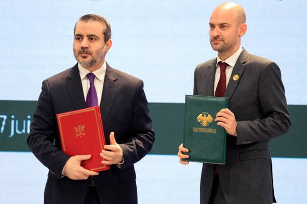 President Macron Visits Syria - Economic Forum Syria s Foreign Affairs Minister Asaad al-Shaibani (L) and France s Foreign Affairs Minister Jean-Noel Barrot pose holding the Framework Agreement on Bilateral Cooperation during an agreement signing ceremony in Damascus on July 7, 2026. French President Emmanuel Macron arrived in Damascus on July 6, 2026 for the first visit by a Western European head of state since Syria s new authorities took power in 2024, an AFP journalist said. Macron, who will depart on July 7, 2026, will advocate for a free, pluralist Syria that respects each of its components and plays a role in moderating Middle East tensions, the French presidency told journalists ahead of his arrival. Photo by Ludovic Marin Pool AB  Copyright: xMarinxLudovic Pool ABACAx