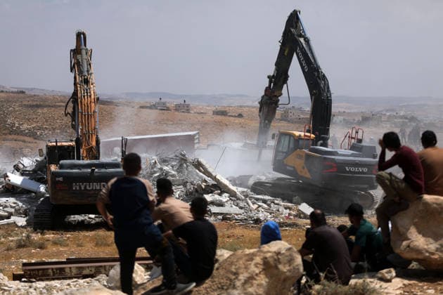 Israeli forces demolish two Palestinian homes in West Bank HEBRON, WEST BANK, PALESTINE - JULY 07: Israeli forces stand by in the area as the Israeli military demolish two Palestinian homes on the grounds that they had been built without permits in Masafer Yatta, south of Hebron, West Bank, Palestine on July 07, 2026. Mamoun Wazwaz Anadolu Hebron West Bank. Editorial use only. Please get in touch for any other usage.  Copyright: x2026xAnadoluxMamounxWazwazx