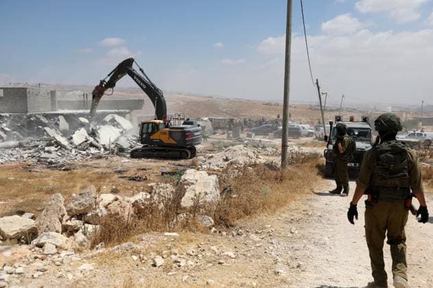Israeli forces demolish two Palestinian homes in West Bank HEBRON, WEST BANK, PALESTINE - JULY 07: Israeli forces stand by in the area as the Israeli military demolish two Palestinian homes on the grounds that they had been built without permits in Masafer Yatta, south of Hebron, West Bank, Palestine on July 07, 2026. Mamoun Wazwaz Anadolu Hebron West Bank. Editorial use only. Please get in touch for any other usage.  Copyright: x2026xAnadoluxMamounxWazwazx