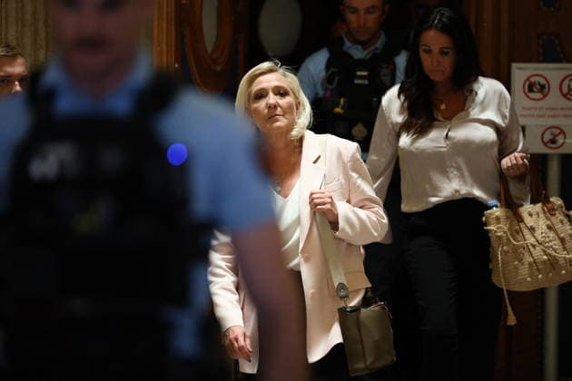 Marine Le Pen Appeal Trial Decision - Paris French far-right Rassemblement National (RN) party, Marine Le Pen leaving Paris courthouse after the decision on the appeal trial of President of the parliamentary group of the French far-right Rassemblement National (RN) party, Marine Le Pen and officials of French far-right Rassemblement National (RN) party on suspicion of embezzlement of European public funds, in Paris on July 7, 2026. The appeal comes after a court last year barred Le Pen from running for office for five years over a European Parliament fake-jobs scam involving her and other officials from her National Rally party. Photo by Florian Poitout ABACAPRESS.COM Paris Ile-de-France France  Copyright: xLafarguexRaphael ABACAx