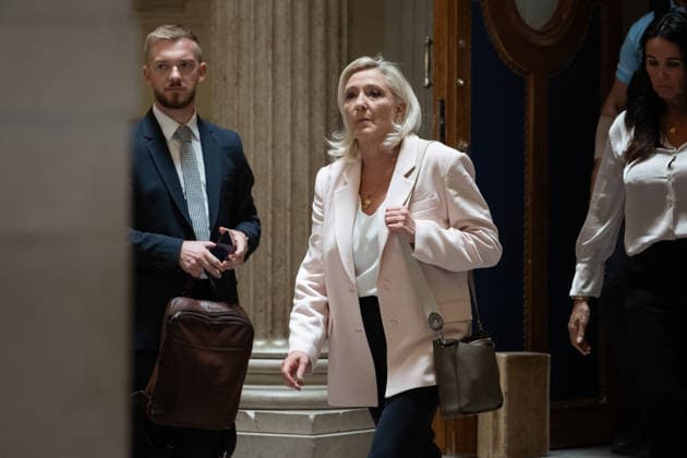 Paris, France, July 7, 2026 - President of Rassemblement National parliamentary group Marine Le Pen leaves after the verdict in the appeal trial of RN former or actual members on charges of embezzlement of European public funds in a case of alleged European Parliament fake jobs at Paris Court of Appeal. An appeals court on July 7, 2026, handed France s far right chief Marine Le Pen a one year term with an ankle tag over a fake jobs scam in the European parliament, casting doubt on whether she will run for president next April. The court also prevented her from running for office for 15 months, a ban expected to have expired this year.  Copyright: xAlexisxSciardx