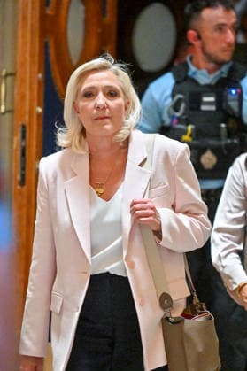 Marine Le Pen, president of the National Rally, leaves the Paris Court of Appeals, France, on July 7, 2026, following the verdict in the appeal trial of former and current RN members accused of embezzling European public funds in a case involving the creation of fictitious jobs at the European Parliament. The Court of Appeals sentenced Marine Le Pen, leader of France’s far right, to one year of house arrest with an electronic ankle monitor for this case, thereby jeopardizing her presidential candidacy next April. She was also barred from running for office for 15 months, a ban that was set to expire this year. Christian Liewig Bestimage President of the Rassemblement National parliamentary group Marine Le Pen leaves after the verdict in th  Copyright: xChristianxLiewigx xBestimagexChristianxLiewigx xBestimagex