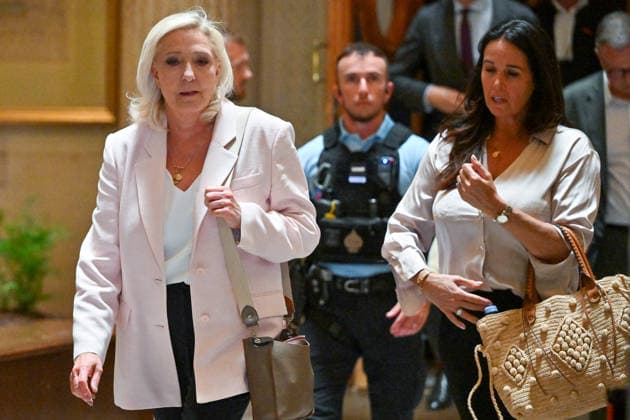 Marine Le Pen, president of the National Rally, accompanied by Member of the European Parliament Catherine Griset, leaves the Paris Court of Appeals, France, on July 7, 2026, following the verdict in the appeal trial of former and current RN members accused of embezzling European public funds in a case involving the creation of fictitious jobs at the European Parliament. The Court of Appeals sentenced Marine Le Pen, leader of the French far right, to one year of house arrest with an electronic ankle monitor in connection with this case, thereby jeopardizing her presidential candidacy next April. She was also barred from running for office for 15 months, a ban that was set to expire this year. Christian Liewig Bestimage President of the Ras  Copyright: xChristianxLiewigx xBestimagexChristianxLiewigx xBestimagex