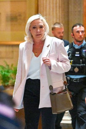 Marine Le Pen, president of the National Rally, leaves the Paris Court of Appeals, France, on July 7, 2026, following the verdict in the appeal trial of former and current RN members accused of embezzling European public funds in a case involving the creation of fictitious jobs at the European Parliament. The Court of Appeals sentenced Marine Le Pen, leader of the French far right, to one year of house arrest with an electronic ankle monitor in connection with this case, thereby jeopardizing her presidential candidacy next April. She was also barred from running for office for 15 months, a ban that was set to expire this year. Christian Liewig Bestimage President of the Rassemblement National parliamentary group Marine Le Pen leaves after  Copyright: xChristianxLiewigx xBestimagexChristianxLiewigx xBestimagex