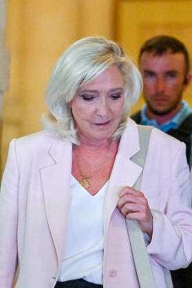Marine Le Pen, president of the National Rally, leaves the Paris Court of Appeals, France, on July 7, 2026, following the verdict in the appeal trial of former and current RN members accused of embezzling European public funds in a case involving the creation of fictitious jobs at the European Parliament. The Court of Appeals sentenced Marine Le Pen, leader of France’s far right, to one year of house arrest with an electronic ankle monitor for this case, thereby jeopardizing her presidential candidacy next April. She was also barred from running for office for 15 months, a ban that was set to expire this year. Christian Liewig Bestimage President of the Rassemblement National parliamentary group Marine Le Pen leaves after the verdict in th  Copyright: xChristianxLiewigx xBestimagexChristianxLiewigx xBestimagex