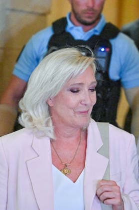 Marine Le Pen, president of the National Rally, leaves the Paris Court of Appeals, France, on July 7, 2026, following the verdict in the appeal trial of former and current RN members accused of embezzling European public funds in a case involving the creation of fictitious jobs at the European Parliament. The Court of Appeals sentenced Marine Le Pen, leader of the French far right, to one year of house arrest with an electronic ankle monitor for this case, thereby jeopardizing her presidential candidacy next April. She was also barred from running for office for 15 months, a ban that was set to expire this year. Christian Liewig Bestimage President of the Rassemblement National parliamentary group Marine Le Pen leaves after the verdict in  Copyright: xChristianxLiewigx xBestimagexChristianxLiewigx xBestimagex