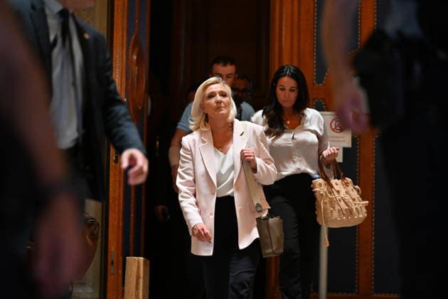 French court shortens Le Pen s ineligibility ban, allowing 2027 presidential run PARIS, FRANCE - JULY 7: Member of parliament for the Rassemblement National (National Rally - RN) party French far-right leader Marine Le Pen exits after the verdict in her appeal trial at the Paris courthouse on the Ile de la Cite in Paris, France, on July 7, 2026. The Paris Court of Appeal on Tuesday shortened National Rally leader Marine Le Pen s ineligibility ban to 45 months, with 30 months suspended, clearing the way for her to run in the 2027 presidential election. After finding her guilty of misusing public funds, the appeals court sentenced Le Pen to 45 months of ineligibility, 30 months of which were suspended, according to Le Monde. Mustafa Yalcin  Copyright: x2026xAnadoluxMustafaxYalcinx