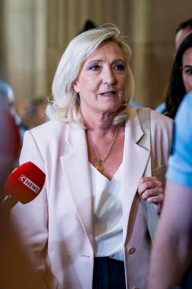 Marine Le Pen, president of the National Rally, leaves the Paris Court of Appeals, France, on July 7, 2026, following the verdict in the appeal trial of former and current RN members accused of embezzling European public funds in a case involving the creation of fictitious jobs at the European Parliament. The Court of Appeals sentenced Marine Le Pen, leader of France’s far right, to one year of house arrest with an electronic ankle monitor in connection with this case, thereby jeopardizing her presidential candidacy next April. She was also barred from running for office for 15 months, a ban that was set to expire this year. Vincenzo Armone Bestimage President of the Rassemblement National parliamentary group Marine Le Pen leaves after the  Copyright: xVincenzoxArnonex xBestimagexVincenzoxArnonex xBestimagex