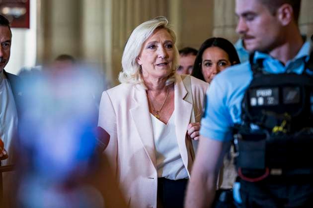 Marine Le Pen, president of the National Rally, leaves the Paris Court of Appeals, France, on July 7, 2026, following the verdict in the appeal trial of former and current RN members accused of embezzling European public funds in a case involving the creation of fictitious jobs at the European Parliament. The Court of Appeals sentenced Marine Le Pen, leader of France’s far right, to one year of house arrest with an electronic ankle monitor in connection with this case, thereby jeopardizing her presidential candidacy next April. She was also barred from running for office for 15 months, a ban that was set to expire this year. Vincenzo Armone Bestimage President of the Rassemblement National parliamentary group Marine Le Pen leaves after the  Copyright: xVincenzoxArnonex xBestimagexVincenzoxArnonex xBestimagex