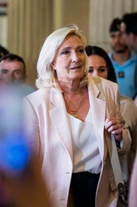Marine Le Pen, president of the National Rally, leaves the Paris Court of Appeals, France, on July 7, 2026, following the verdict in the appeal trial of former and current RN members accused of embezzling European public funds in a case involving the creation of fictitious jobs at the European Parliament. The Court of Appeals sentenced Marine Le Pen, leader of France’s far right, to one year of house arrest with an electronic ankle monitor in connection with this case, thereby jeopardizing her presidential candidacy next April. She was also barred from running for office for 15 months, a ban that was set to expire this year. Vincenzo Armone Bestimage President of the Rassemblement National parliamentary group Marine Le Pen leaves after the  Copyright: xVincenzoxArnonex xBestimagexVincenzoxArnonex xBestimagex