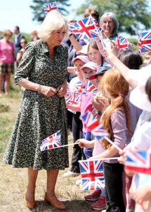 . 07 07 2026. Ashdown Forest. United Kingdom. Queen Camilla during a visit to Ashdown Forest, United Kingdom , to commemorate 100 years of Winnie-the-Pooh . During the visit she played a game of pooh sticks on pooh sticks bridge with children .  xPoolx xi-Imagesx IIM-26893-0021