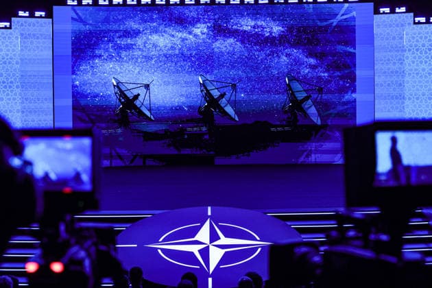 July 7, 2026, Ankara, Turkiye, Turkiye: An image of a satellite disks with a backdrop of a starry sky is projected on screen above the NATO logo during the Space and Surveillance segment of the NATO Summit Defence Industry Forum in Ankara. As technology develops rapidly and space activity accelerates, questions around access, security, governance and regulation have become increasingly prominent amid ongoing conflicts. Ankara Turkiye  - ZUMAo116 20260707_znp_o116_005 Copyright: xBiancaxOterox