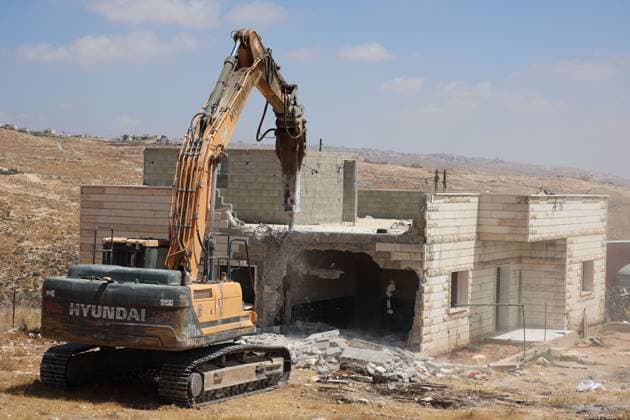 Israeli Forces Demolish Home in Masafer Yatta, Displacing Family of Eight Masafer Yatta, West Bank July 7, 2026: Israeli forces demolish the home of Palestinian detainee Mousa Al-Adra in the village of Al-Deirat in the Masafer Yatta area, south of Hebron, in the occupied West Bank, July 7, 2026. Israeli authorities said the structure lacked the required building permits. The demolition displaced a family of eight, including two parents and six children. Masafer Yatta Palestine, State of Copyright: x xMosabxshawerx xJNAxPressx