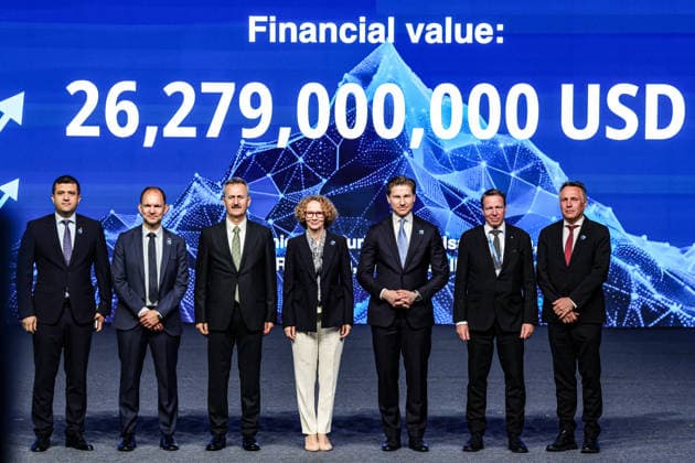 July 7, 2026, Ankara, Turkiye, Turkiye: ASELSAN CEO, AHMET AKYOL(L), President of the Turkish Secretariat of Defence Industries HALUK GORGUN (3rd L), and NATO Deputy Secretary General RADMILA SEKERINSKA (4th L) stand on stage with international defence officials and corporate executives before a digital screen displaying a total contract value of 26,279,000,000 USD during the Integrated Air and Missile Defence (IAMD) segment of the NATO Summit Defence Industry Forum at the ATO Congresium. The monumental multi-billion-dollar framework coordinates advanced multi-layered interception architecture and anti-air production lines across allied nations. Ankara Turkiye  - ZUMAo116 20260707_znp_o116_032 Copyright: xBiancaxOterox