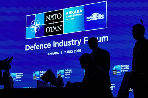 July 7, 2026, Ankara, Turkiye, Turkiye: An allied official is silhouetted while signing an agreement at a desk during a monumental mass signing ceremony before a large digital screen at the NATO Summit Defence Industry Forum at the ATO Congresium. The historic event saw alliance nations and global aerospace executives simultaneously finalise more than 70 billion USD in combined transatlantic defence procurement contracts, establishing major unified frameworks across integrated air defence, counter-drone networks, and precision strike capabilities. Ankara Turkiye - ZUMAo116 20260707_znp_o116_035 Copyright: xBiancaxOterox