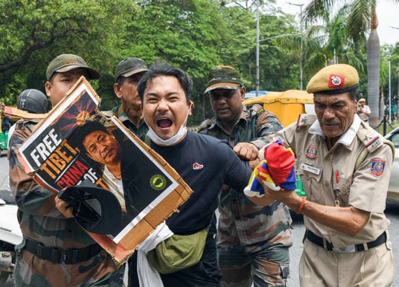 TYC Protests Near the Chinese Embassy in New Delhi New Delhi, Jul 07 (ANI): Police personnel detain a Tibetan Youth Congress (TYC) supporter as the party stages a protest over their various demands near the Chinese Embassy, in New Delhi on Tuesday. NEW DELHI Delhi India Copyright: xANIx ANI_20260707076