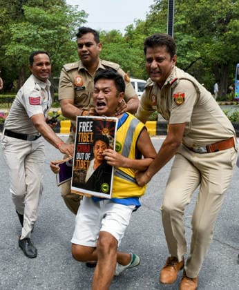 TYC Protests Near the Chinese Embassy in New Delhi New Delhi, Jul 07 (ANI): Police personnel detain a Tibetan Youth Congress (TYC) supporter as the party stages a protest over their various demands near the Chinese Embassy, in New Delhi on Tuesday. NEW DELHI Delhi India Copyright: xANIx ANI_20260707078