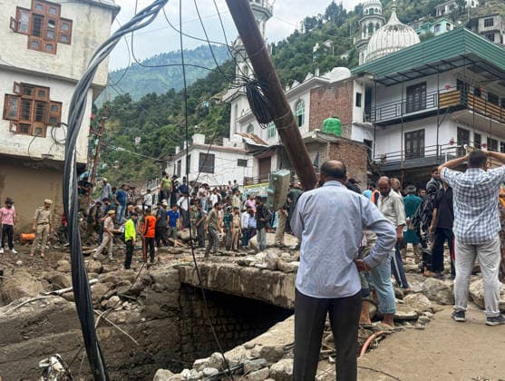 People walk over the debris that lies scattered after flood Doda, Jul 07 (ANI): People walk over the debris that lies scattered after flood, in Doda on Tuesday. Doda Jammu and Kashmir India Copyright: xANIx ANI_20260707332