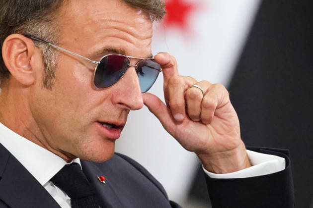 President Macron and President al-Sharaa Joint Press Conference - Damascus France s President Emmanuel Macron adjusts his sunglasses as he attends a joint press conference with Syrian President in Damascus on July 7, 2026. French President Emmanuel Macron arrived in Damascus on July 6, 2026 for the first visit by a Western European head of state since Syria s new authorities took power in 2024, an AFP journalist said. Macron, who will depart on July 7, 2026, will advocate for a free, pluralist Syria that respects each of its components and plays a role in moderating Middle East tensions, the French presidency told journalists ahead of his arrival. Photo by Ludovic Marin Pool ABACAPRESS.COM Damascus Syria  Copyright: xMarinxLudovic Pool ABACAx