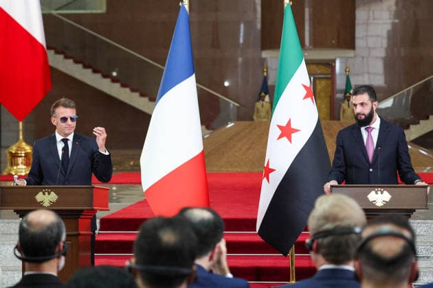 President Macron and President al-Sharaa Joint Press Conference - Damascus France s President Emmanuel Macron (L) and Syrian President Ahmed al-Sharaa give a joint press conference in Damascus on July 7, 2026. French President Emmanuel Macron arrived in Damascus on July 6, 2026 for the first visit by a Western European head of state since Syria s new authorities took power in 2024, an AFP journalist said. Macron, who will depart on July 7, 2026, will advocate for a free, pluralist Syria that respects each of its components and plays a role in moderating Middle East tensions, the French presidency told journalists ahead of his arrival. Photo by Ludovic Marin Pool ABACAPRESS.COM Damascus Syria  Copyright: xMarinxLudovic Pool ABACAx