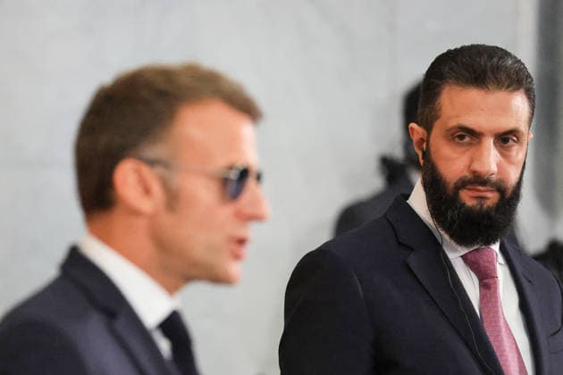 President Macron and President al-Sharaa Joint Press Conference - Damascus France s President Emmanuel Macron (L) and Syrian President Ahmed al-Sharaa give a joint press conference in Damascus on July 7, 2026. French President Emmanuel Macron arrived in Damascus on July 6, 2026 for the first visit by a Western European head of state since Syria s new authorities took power in 2024, an AFP journalist said. Macron, who will depart on July 7, 2026, will advocate for a free, pluralist Syria that respects each of its components and plays a role in moderating Middle East tensions, the French presidency told journalists ahead of his arrival. Photo by Ludovic Marin Pool ABACAPRESS.COM Damascus Syria  Copyright: xMarinxLudovic Pool ABACAx
