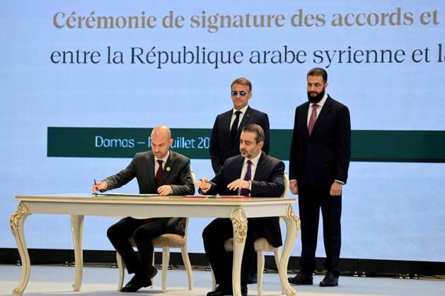 President Macron Visits Syria - Economic Forum France s Foreign Affairs Minister Jean-Noel Barrot (L) and Syria s Foreign Minister Asaad al-Shaibani (2nd R) sign the Framework Agreement on Bilateral Cooperation flanked by France s President Emmanuel Macron (2nd L) and Syria s Foreign Minister Asaad al-Shaibani during an agreement signing ceremony in Damascus on July 7, 2026. French President Emmanuel Macron arrived in Damascus on July 6, 2026 for the first visit by a Western European head of state since Syria s new authorities took power in 2024, an AFP journalist said. Macron, who will depart on July 7, 2026, will advocate for a free, pluralist Syria that respects each of its components and plays a role in moderating Middle East tensions  Copyright: xMarinxLudovic Pool ABACAx