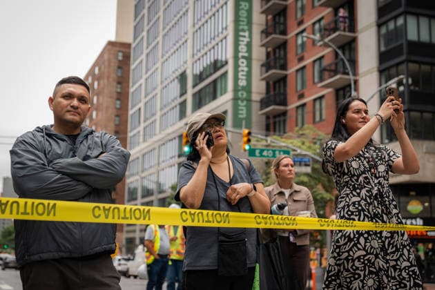 July 7, 2026, New York City, New York, United States: Bystanders on site New York City United States - ZUMAs378 20260707_zip_s378_021 Copyright: xIoannxMariaxStacewiczx