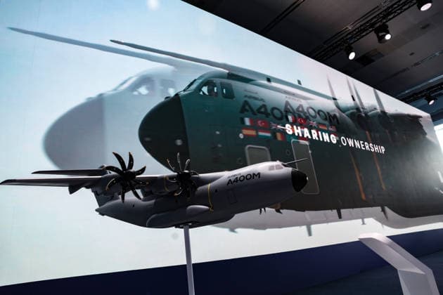 July 7, 2026, Ankara, Turkiye, Turkiye: A scale model of an Airbus A400M military transport aircraft is displayed on the exhibition floor before a digital screen reading Ã¢â‚¬oeSharing OwnershipÃ¢â‚¬Â during the NATO Summit Defence Industry Forum at the ATO Congresium in Ankara. The display highlighted a newly announced multinational initiative to develop a shared A400M fleet, drawing on the A330 MRTT model to strengthen Allied strategic airlift, logistics and deployment capabilities. Ankara Turkiye - ZUMAo116 20260707_znp_o116_066 Copyright: xBiancaxOterox