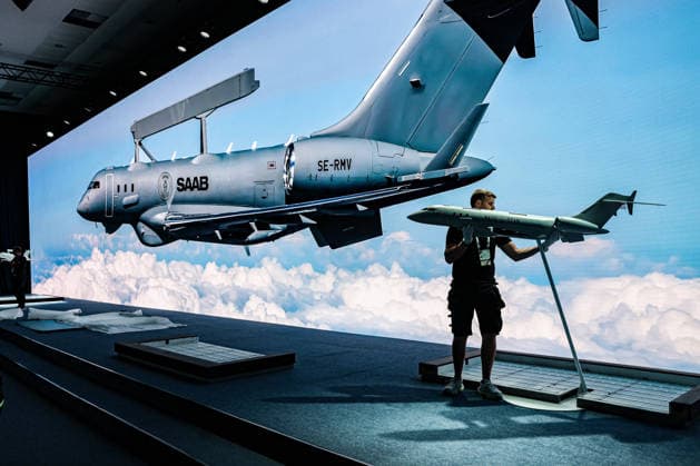 July 7, 2026, Ankara, Turkiye, Turkiye: An exhibition worker removes a scale model of the Saab GlobalEye Airborne Early Warning and Control (AEW&C) aircraft from its stand as disassembly begins following the conclusion of the NATO Summit Defence Industry Forum (NSDIF) at the ATO Congresium. The specialized industry exhibition closed after a historic session that saw alliance member nations and global aerospace executives finalize more than 70 billion USD in combined transatlantic defence procurement contracts, joint manufacturing agreements, and strategic capability frameworks. Ankara Turkiye - ZUMAo116 20260707_znp_o116_068 Copyright: xBiancaxOterox
