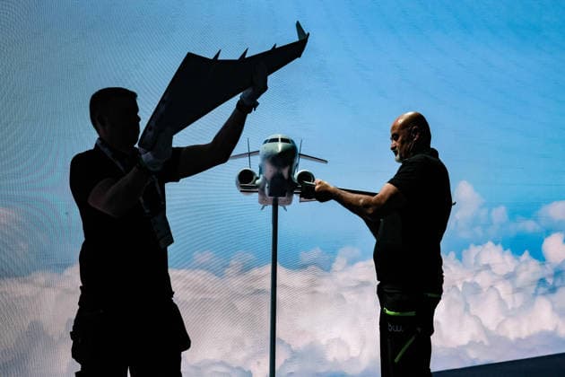 July 7, 2026, Ankara, Turkiye, Turkiye: Exhibition workers remove a scale model of the Saab GlobalEye Airborne Early Warning and Control (AEW&C) aircraft from its stand as disassembly begins following the conclusion of the NATO Summit Defence Industry Forum (NSDIF) at the ATO Congresium. The specialized industry exhibition closed after a historic session that saw alliance member nations and global aerospace executives finalize more than 70 billion USD in combined transatlantic defence procurement contracts, joint manufacturing agreements, and strategic capability frameworks. Ankara Turkiye - ZUMAo116 20260707_znp_o116_071 Copyright: xBiancaxOterox