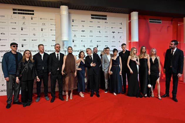 The 60th Karlovy Vary International Film Festival continued on its fifth day, in Karlovy Vary, Czech Republic, on July 7, 2026. A delegation of filmmakers presented the competition film Three Weeks Later (Serbia, Bulgaria, Italy, Croatia, Luxembourg) in the Grand Ballroom of the Thermal Hotel. Director Miroslav Terzic is standing in the middle (wearing glasses and a goatee beard). (CTKxPhoto SlavomirxKubes) CTKPhotoP2026070709527  CTKPhotoP2026070709527