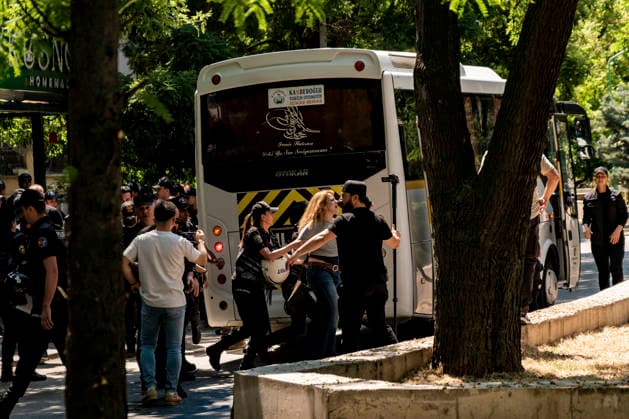 Anti NATO Demonstration Ankara Turkey July 7 Police officers detain a woman during an anti-NATO protest in Ankara, Turkey, on July 7, 2026. Ankara is hosting the NATO Summit on July 7-8, bringing together heads of state and government from numerous member countries. As security measures were intensified across the capital, police dispersed the demonstration, detained numerous protesters, and restricted access for journalists. Ankara Ankara Turkey Copyright: xMuratxKocabasx