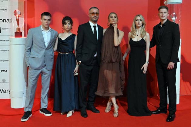 The 60th Karlovy Vary International Film Festival continued on its fifth day, in Karlovy Vary, Czech Republic, on July 7, 2026. A delegation of filmmakers presented the competition film Three Weeks Later (Serbia, Bulgaria, Italy, Croatia, Luxembourg) in the Grand Ballroom of the Thermal Hotel. From left: actors Jovan Ginic and Andjela Alavirevic, producer Branislav Trifunovic, and actors Tihana Lazovic Trifunovic, Klara Karaulic, and Andrija Markovic. (CTKxPhoto SlavomirxKubes) CTKPhotoP2026070709533  CTKPhotoP2026070709533