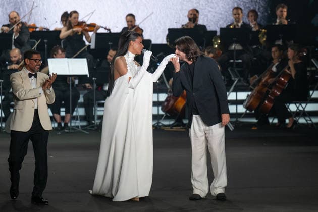 PFW - Stephane Rolland Runway Conductor Hani Farahat, Oumaima Taleb and Stephane Rolland walk the runway during the Stephane Rolland Haute Couture Fall Winter 2026 2027 show as part of Paris Fashion Week in Paris, France on July 07, 2026. Photo by Laurent Zabulon ABACAPRESS.COM  Copyright: xZabulonxLaurent ABACAx