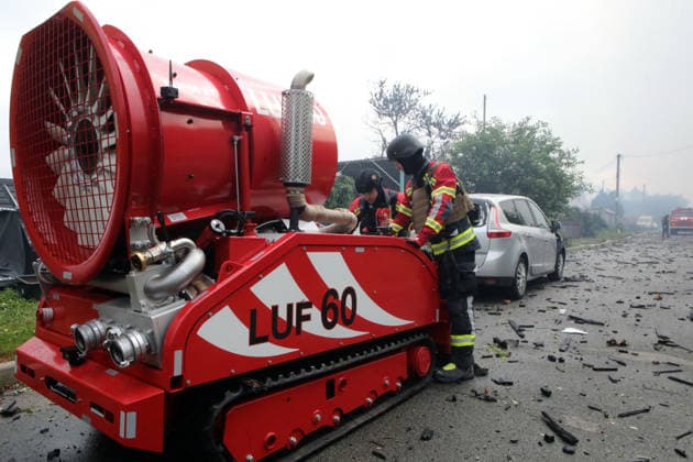 RECORD DATE NOT STATED Rescue workers and a LUF 60 firefighting robot stand beside a damaged car during recovery operations following a massive combined Russian attack in Vyshneve, Kyiv region, Ukraine, on July 6, 2026. Russian forces launched a large-scale attack on the city and the region using ballistic and cruise missiles, as well as attack drones. Dozens of houses on five streets were destroyed, while warehouses and businesses sustained damage. More than 600 local residents were evacuated due to the detonation of explosive hazards. Six people were killed and at least 26 others were injured, including a nine-month-old baby and a 12-year-old child (Photo by Volodymyr Tarasov Ukrinform) Russian forces strike Zaporizhzhia with two guided bombs  Copyright: xVolodymyrxTarasovx