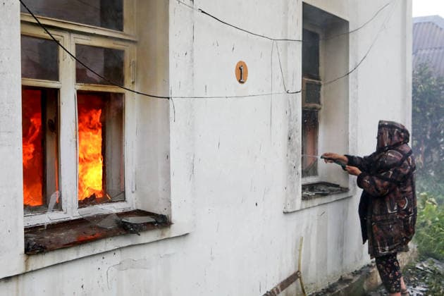 RECORD DATE NOT STATED A woman extinguishes a fire in a residential building following a massive combined Russian attack in Vyshneve, Kyiv region, Ukraine, on July 6, 2026. Russian forces launched a large-scale attack on the city and the region using ballistic and cruise missiles, as well as attack drones. Dozens of houses on five streets were destroyed, while warehouses and businesses sustained damage. More than 600 local residents were evacuated due to the detonation of explosive hazards. Six people were killed and at least 26 others were injured, including a nine-month-old baby and a 12-year-old child (Photo by Volodymyr Tarasov Ukrinform) Russian forces strike Zaporizhzhia with two guided bombs  Copyright: xVolodymyrxTarasovx