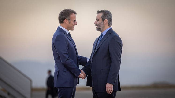France s President Emmanuel Macron (L) is welcomed by Syria s Foreign Minister Asaad al-Shaibani (R) as he arrives for a state visit at the Damascus International Airport in Damascus in Syria, on Tuesday, July 6, 2026. Security sources reported that more than 15 people were injured in an explosion at a cafÃ in central Damascus, as French leader Emmanuel Macron made the first post-conflict visit to Damascus by a Western European leader.  SYR2026070708 SyrianxMinistryxofxForeignxAffai