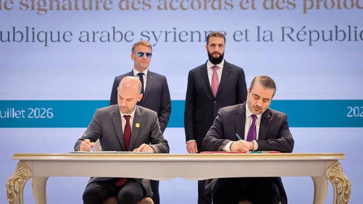 France s Foreign Affairs Minister Jean-Noel Barrot (L) and Syria s Foreign Minister Asaad al-Shaibani (2nd R) sign the Framework Agreement on Bilateral Cooperation flanked by France s President Emmanuel Macron (2nd L) and Syria s Foreign Minister Asaad al-Shaibani during an agreement signing ceremony in Damascus in Syria, on Tuesday, July 7, 2026. Security sources reported that more than 15 people were injured in an explosion at a café in central Damascus, as French leader Emmanuel Macron made the first post-conflict visit to Damascus by a Western European leader.  SYR2026070712 SyrianxMinistryxofxForeignxAffai