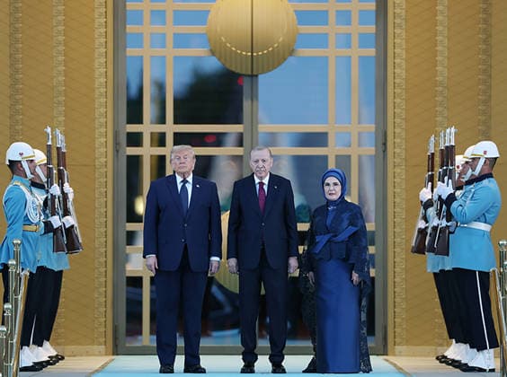 Turkey s President Tayyip Erdogan (C) and his wife Emine Erdogan (R) welcoming US President Donald Trump (L) during a reception hosted for heads of stade and government attending the 36th NATO Heads of State and Government Summit at the Presidential Complex in Ankara. on Tuesday on July 7, 2026.  TUR2026070733 TurkishxPresidencyxOffice