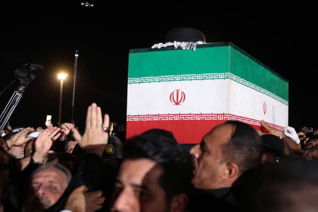 Body of slain Iranian supreme leader arrives in Iraq ahead of funeral procession NAJAF, IRAQ - JULY 8: (----EDITORIAL USE ONLY – MANDATORY CREDIT - IRANIAN PRESIDENCY HANDOUT - NO MARKETING NO ADVERTISING CAMPAIGNS - DISTRIBUTED AS A SERVICE TO CLIENTS----) People carry the coffin of Iran s late Supreme Leader Ayatollah Ali Khamenei after landing at Najaf International Airport ahead of the scheduled funeral processions, in Najaf, Iraq, on July 8, 2026. Khamenei was killed in US-Israeli strikes on Iran that began on Feb. 28, triggering weeks of retaliatory attacks from Tehran targeting Israel and Gulf countries hosting US assets. Iranian Presidency Handout Anadolu Najaf Iraq. Editorial use only. Please get in touch for any other usag  Copyright: x2026xAnadoluxIranianxPresidencyx xHandoutx