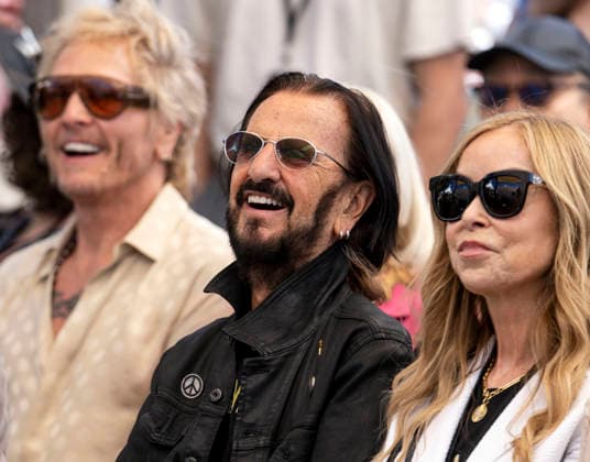 July 07, 2026 - Beverly Hills, California, USA - RINGO STARR, who turns 86 today, listens to the music played in his honor during his Annual Peace & Love Birthday Celebration at Beverly Hills Garden Park. Beverly Hills USA - ZUMAce6_ 20260707_zaf_ce6_020 Copyright: xBrianxCahnx
